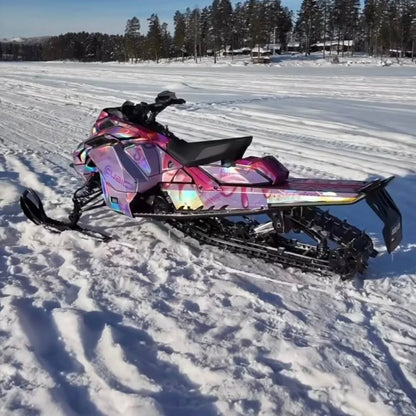 Lia Larsson's Drip Check Ski-Doo on a frozen lake