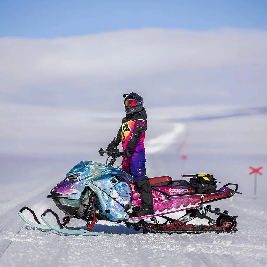 Lia Larsson with her Galaxy Ski-Doo in the mountains
