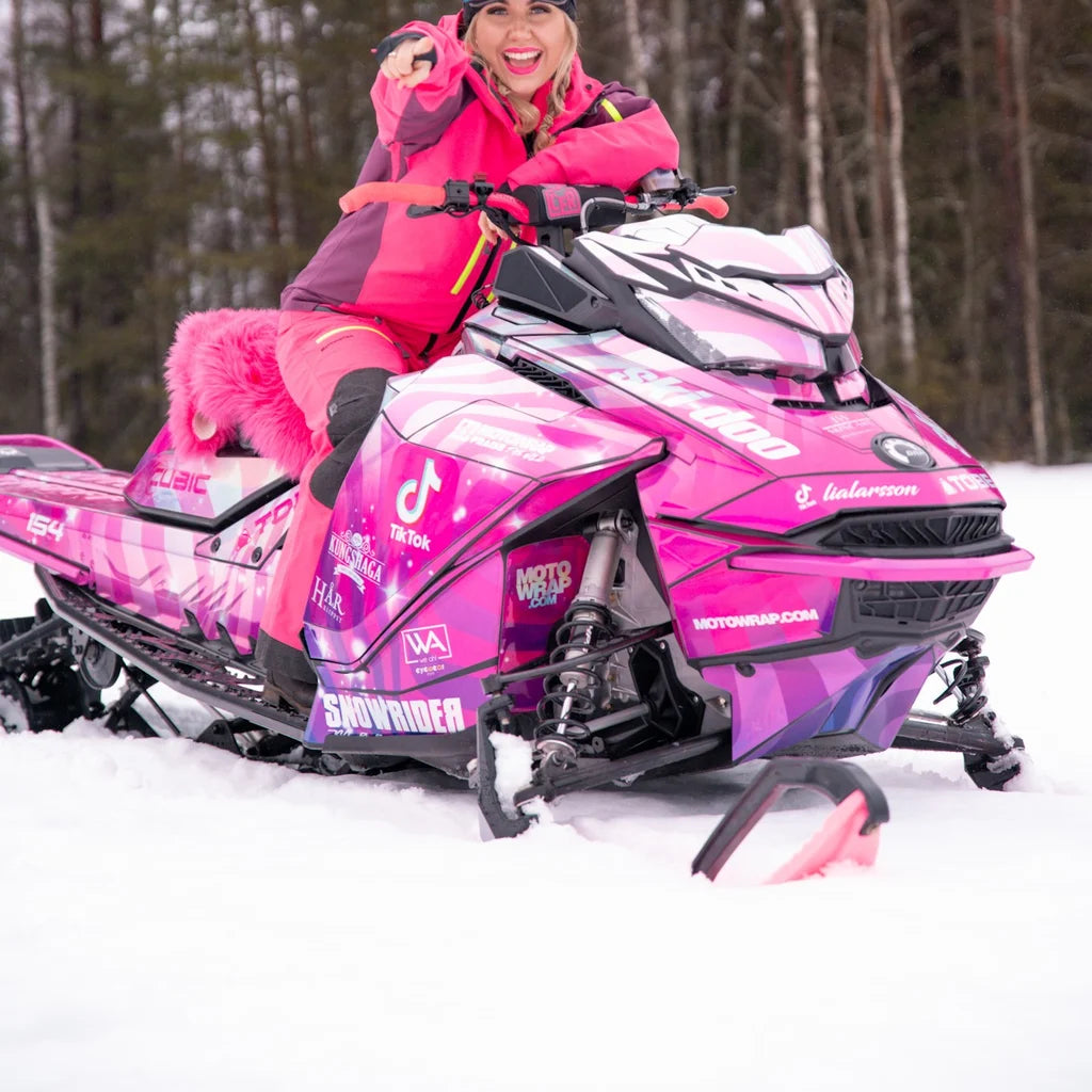 Lia Larsson on her Pink Warp Ski-Doo